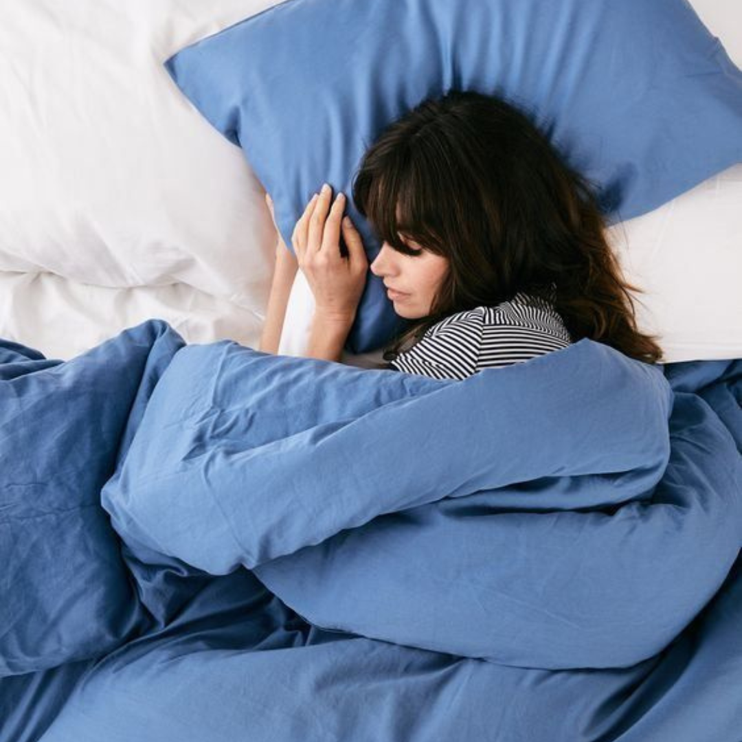 Woman Resting in Bed